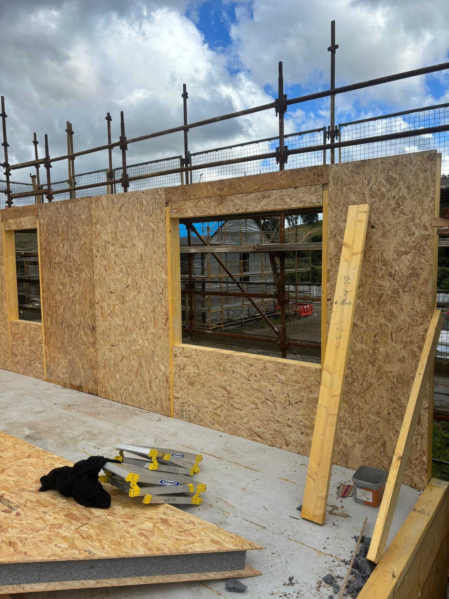 Timber wall panel with a window opening